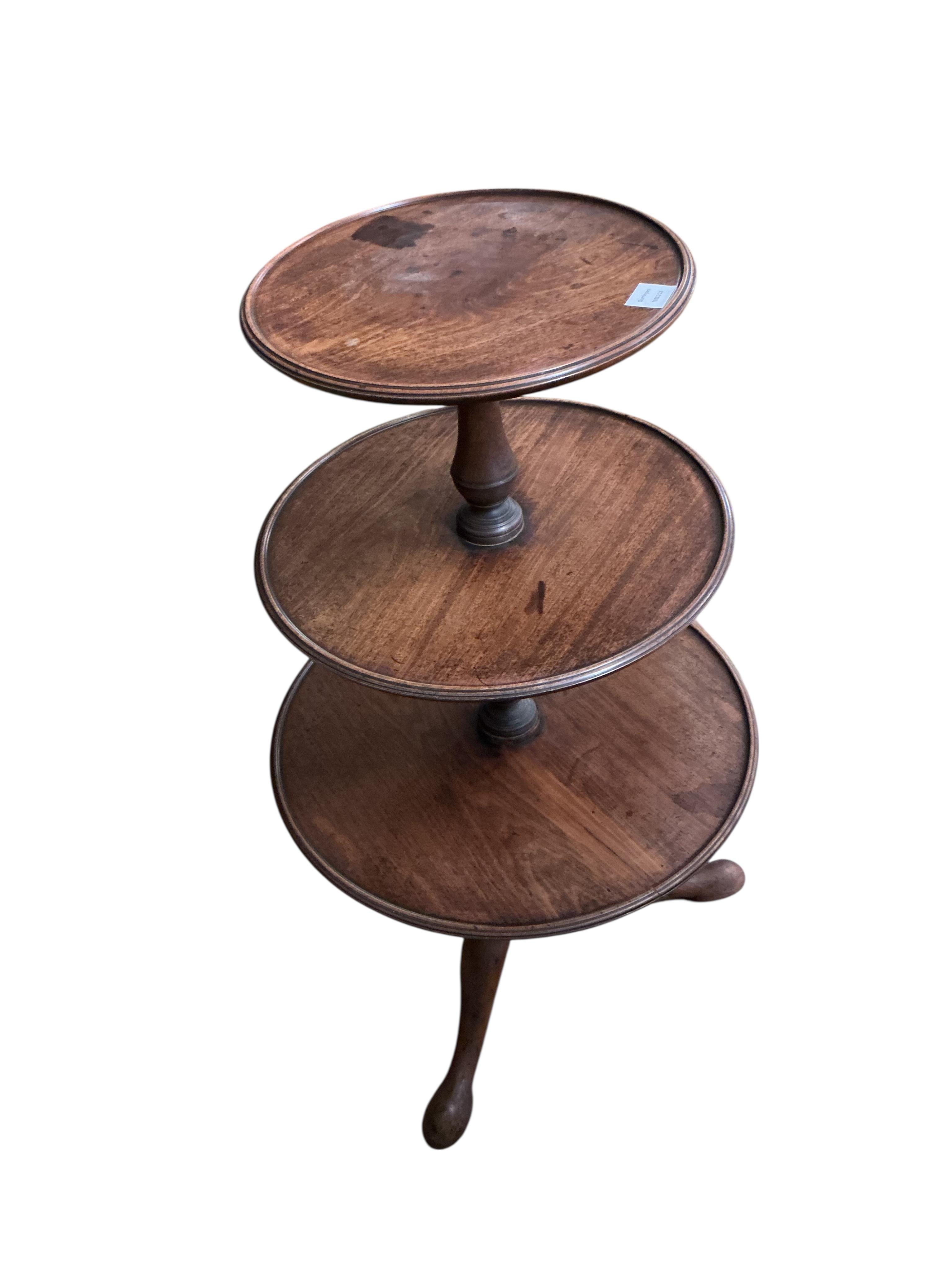 A George III mahogany three tier whatnot, height 106cm